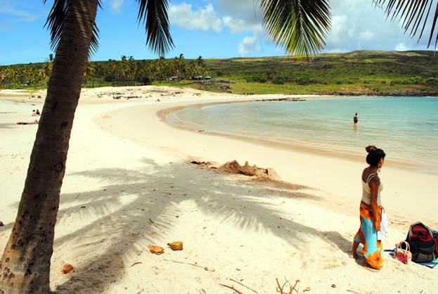 https://www.easterisland.travel/images/media/images/nature/rapa-nui-woman-at-anakena-beach.jpg